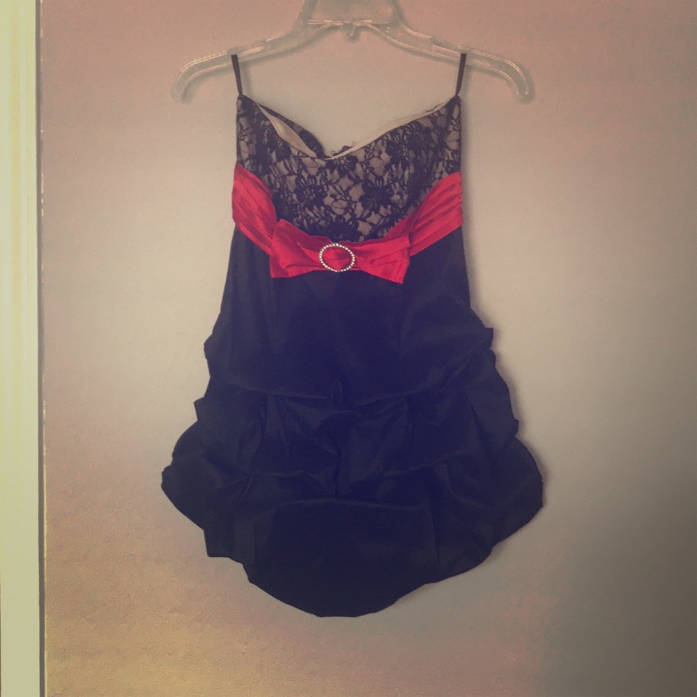 Black mini dress with red ribbon
